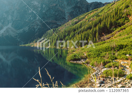 Tatra National Park in Poland. Famous mountains lake Morskie oko or sea eye lake In High Tatras. Five lakes valley 112097365