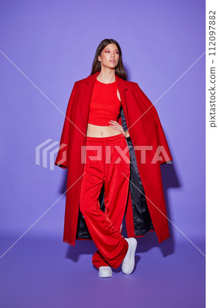 Fashion asian female model in red coat. 112097882