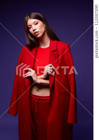 Fashion asian female model in red coat. Fashion asian female model in red coat. 112097890