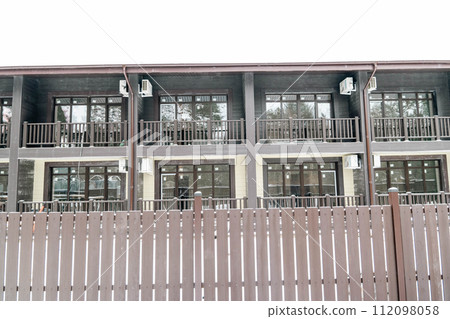 Charming winter hotel with balcony-adorned rooms and air conditioning Charming winter hotel with balcony-adorned rooms and air conditioning 112098058