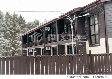 Cozy winter hotel offering rooms with private balconies and air conditioning Cozy winter hotel offering rooms with private balconies and air conditioning 112098059