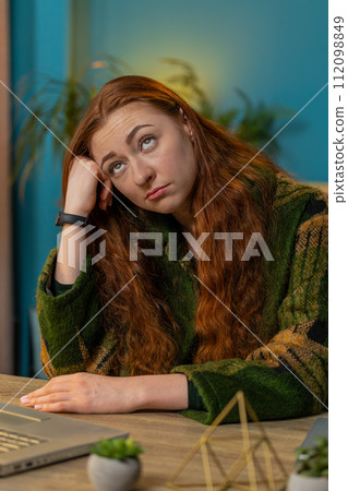Sad frustrated pensive annoyed woman suffers from unfair situation bankruptcy stress at home office Sad frustrated pensive annoyed woman suffers from unfair situation bankruptcy stress at home office 112098849