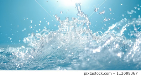 Water splash isolated on soft blue background Water splash isolated on soft blue background 112099367