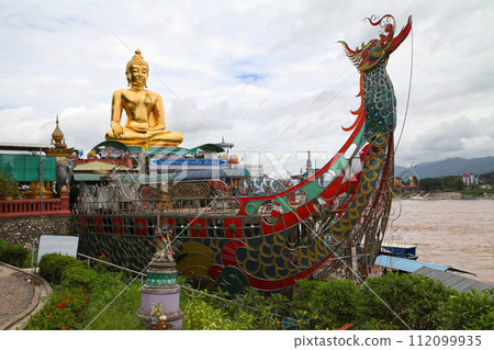 Chiang Saen golden Buddha on boat 112099935