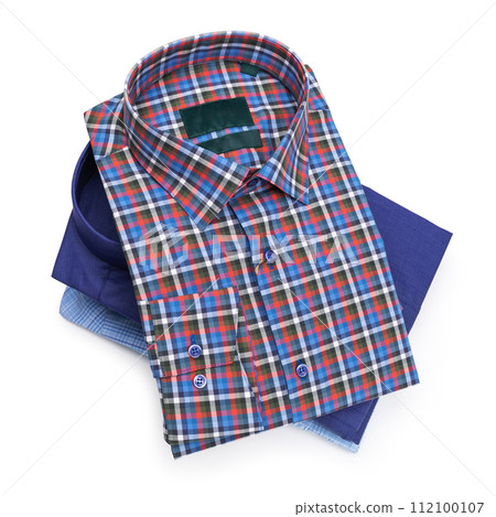 Three folded men's long sleeve button down shirts isolated on white background Three folded men's long sleeve button down shirts isolated on white background 112100107