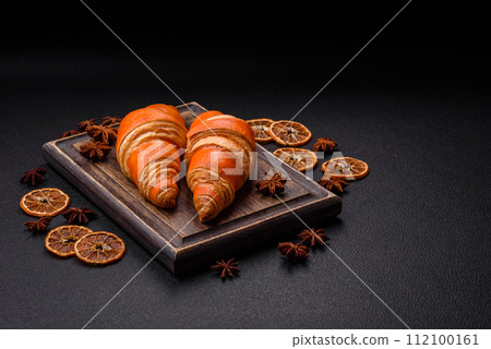 Delicious fresh, crispy French croissants with sweet filling  112100161