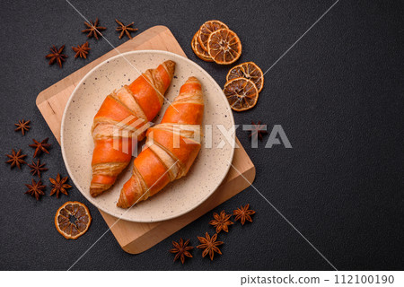 Delicious fresh, crispy French croissants with sweet filling  112100190