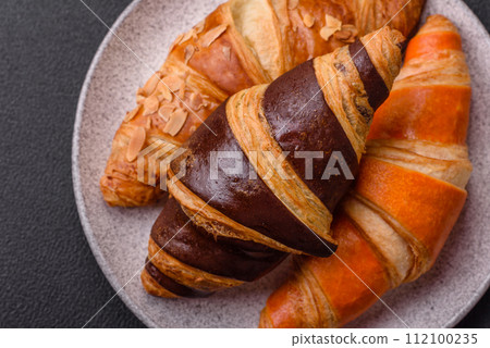 Delicious fresh, crispy French croissants with sweet filling  112100235
