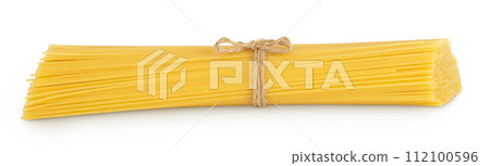 uncooked spaghetti or yellow pasta isolated on white background 112100596