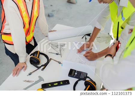 businesswoman hands using a calculator to check company finances and earnings and budget businesswoman hands using a calculator to check company finances and earnings and budget 112101373