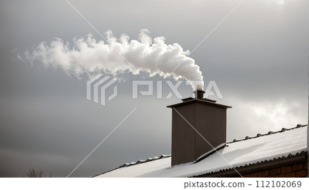 Dense smoke comes out of the chimney of a private house due to the burning of wood Dense smoke comes out of the chimney of a private house due to the burning of wood 112102069