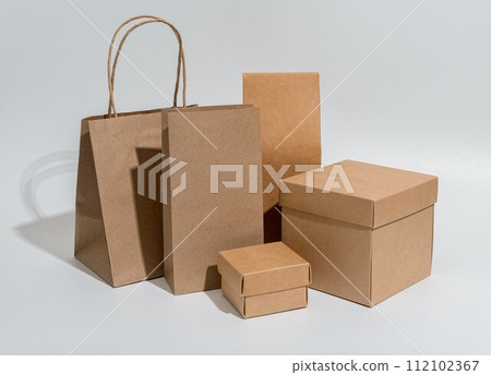 Kraft packages, boxes, bag, brown beige packs for gifts, purchases set 112102367