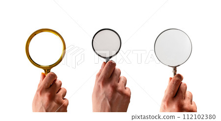 Hand holding magnifying glass, lens, magnifier, loupe isolated on white background Hand holding magnifying glass, lens, magnifier, loupe isolated on white background 112102380
