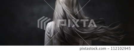 Rear view of a girl with flowing long gray hair, care and hair care concept, banner 112102945