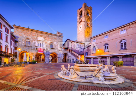 Bergamo, Italy - Piazza Vecchia in Citta Alta at dusk, beautiful historical town in Lombardy 112103944