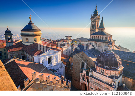 Bergamo, Lombardy - Italy. Upper view from  Campanone with Piazza Duomo. 112103948