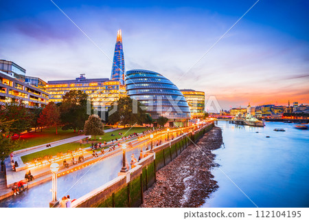 London, United Kingdom. Skyline view of the famous New London, City Hall and Shard, Thames River southbank. London, United Kingdom. Skyline view of the famous New London, City Hall and Shard, Thames River southbank. 112104195