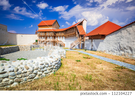 Feldioara, Romania. Summer sunny landscape with Marienburg Fortress, Transylvania. Feldioara, Romania. Summer sunny landscape with Marienburg Fortress, Transylvania. 112104227