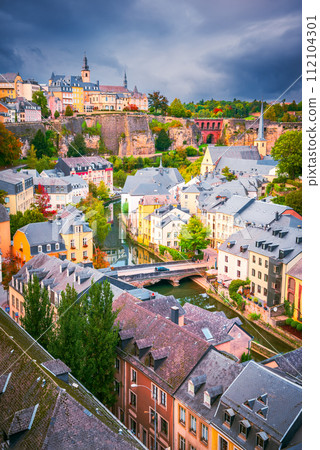 Luxembourg, Luxembourg City. Grund district on Alzette Valley, aerial view. 112104301