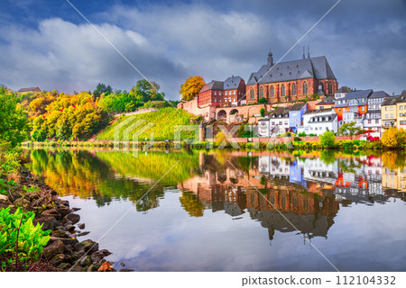 Saarburg, Germany - Amazing water reflection on Saar River. 112104332