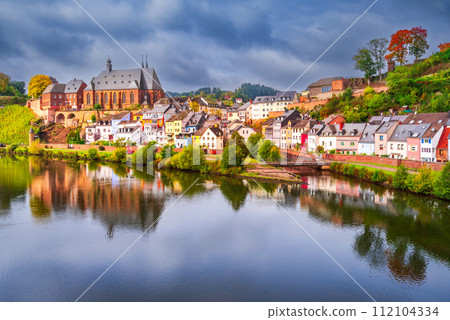 Saarburg, Germany - Old town and Saar River reflection. 112104334