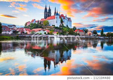 Meissen, Germany. Sunset colored sky on Albrechtsburg castle and cathedral on the River Elbe, Saxony. 112104480