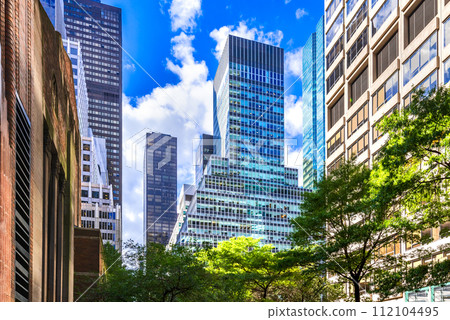 New York, United States. Famous Park Avenue and skyscrapers in Manhattan, New York City in United States of America. New York, United States. Famous Park Avenue and skyscrapers in Manhattan, New York City in United States of America. 112104495