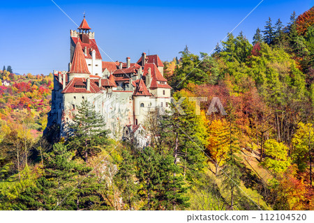 Brasov, Romania. Autumn stunning colored landscape with Bran Castle, known for the myth of Dracula, Transylvania. 112104520