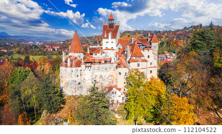 Brasov, Romania. Autumn drone view Bran Castle, known for the myth of Dracula, Transylvania. Brasov, Romania. Autumn drone view Bran Castle, known for the myth of Dracula, Transylvania. 112104522