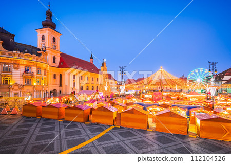 Sibiu, Romania. Christmas Market in Large Square, medieval downtown of Transylvania, famous European Xmas Fair. 112104526