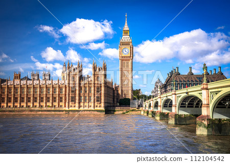 London, United Kingdom. Westminster Bridge, Big Ben and House of Commons building in background, travel english landmark on sunny day. 112104542