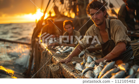 A group of fishermen is on a big boat in the sea. They are taking fish out of the nets, pulling them up one by one. Hardworking fishermen are hauling in their catch form the nets Generative AI. A group of fishermen is on a big boat in the sea. They are taking fish out of the nets, pulling them up one by one. Hardworking fishermen are hauling in their catch form the nets Generative AI. 112105482