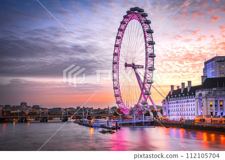 The London Eye on the South Bank of the River Thames at night, United Kingdom capital city, London. The London Eye on the South Bank of the River Thames at night, United Kingdom capital city, London. 112105704