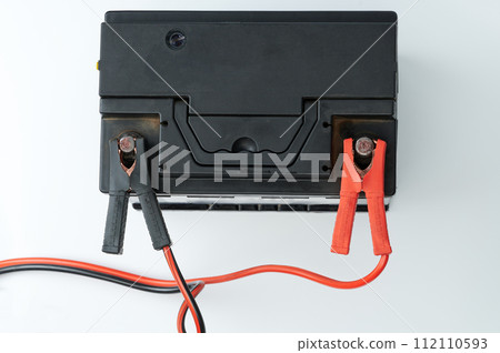 Charging black car battery 112110593