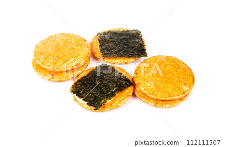 Japanese rice cracker isolated on white background Japanese rice cracker isolated on white background 112111507
