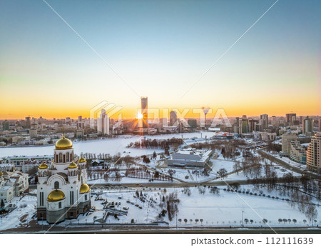 Winter Yekaterinburg and Temple on Blood in beautiful blue clear sunset. Aerial view of Yekaterinburg, Russia. Translation of the text on the temple 112111639