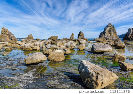 Hashigui Rocks amazing stone formations in Kushimoto Town in Kii Peninsula of Wakayama Prefecture in Japan 112111876