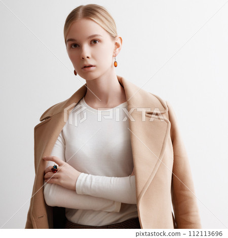 Beautiful female model. Fashionable confident Beautiful female model. Fashionable confident 112113696