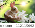 Happy Easter holiday background. Cute miniature  rabbit in egg shell with easter egg elements and spring flowers. 112115092