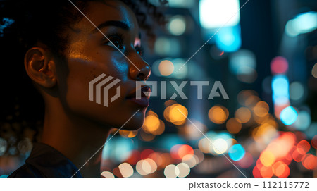 AI-generated content. Close up of a young successful African American business woman looking at the night city with professional cinematic light 112115772