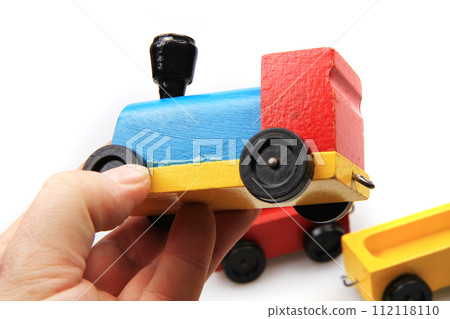 old wooden train toy isolated old wooden train toy isolated 112118110