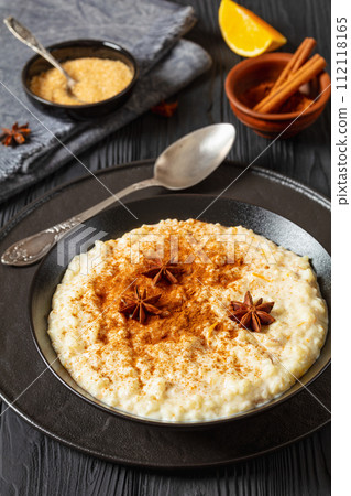 rizogalo, creamy greek rice pudding in a bowl rizogalo, creamy greek rice pudding in a bowl 112118165