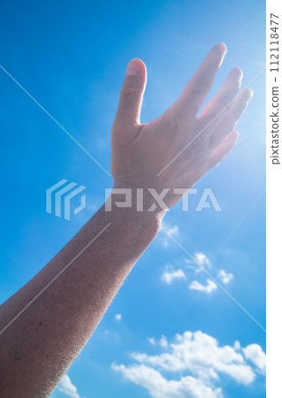 hand, blue sky, beach 112118477