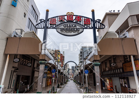 Shinsekai neighbourhood in south Osaka downtown Minami area, famous for many restaurants, shops, bars and pachinko parlours 18 February 2024 Shinsekai neighbourhood in south Osaka downtown Minami area, famous for many restaurants, shops, bars and pachinko parlours 18 February 2024 112118927