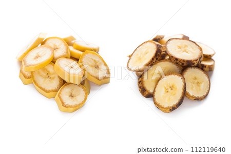 Fresh and few days banana round slices on white background. 112119640