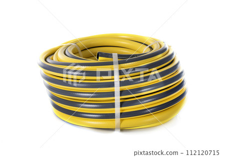 garden hose in front of white background garden hose in front of white background 112120715