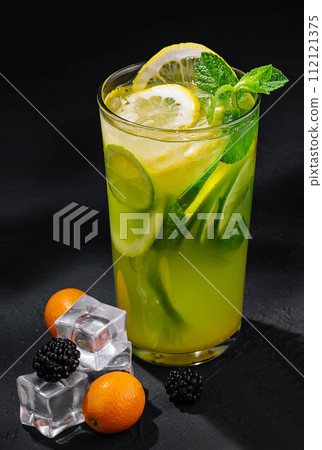 Refreshing lemonade with orange, lime and mint Refreshing lemonade with orange, lime and mint 112121375