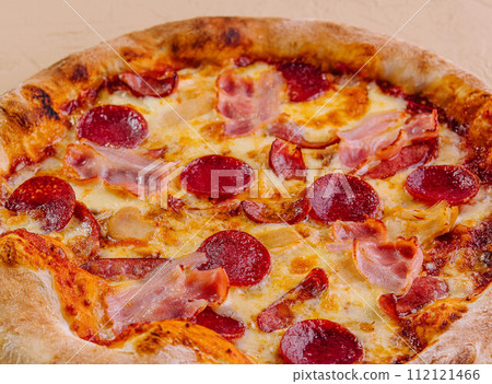 pepperoni pizza with ham on wood 112121466