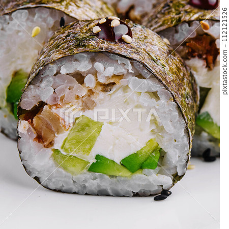 sushi maki with eel and avocado sushi maki with eel and avocado 112121526