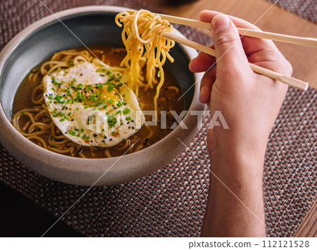 Kimchi noodle spicy soup with egg Kimchi noodle spicy soup with egg 112121528